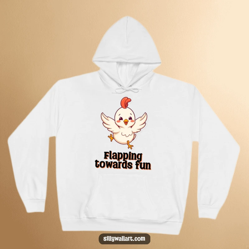 Funny hoodie depicting a delighted rubber chicken with tiny wings comically trying to fly, soft and humorous.