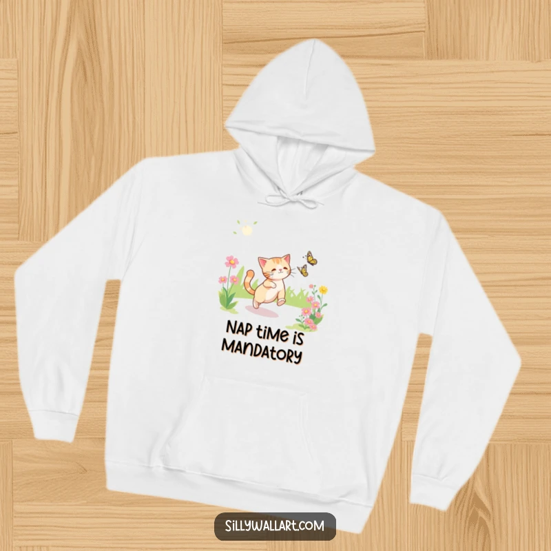 Funny hoodie showing a cat enthusiastically pursuing a butterfly in a cheerful, sunny garden scene.