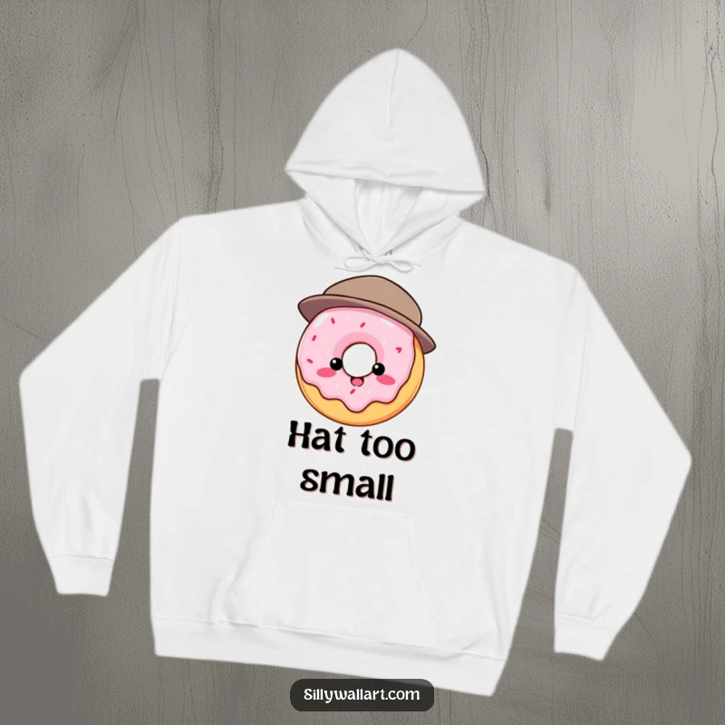 Funny hoodie: Round donut comically struggling to wear a tiny hat, cozy and humorous apparel for quirky fun.