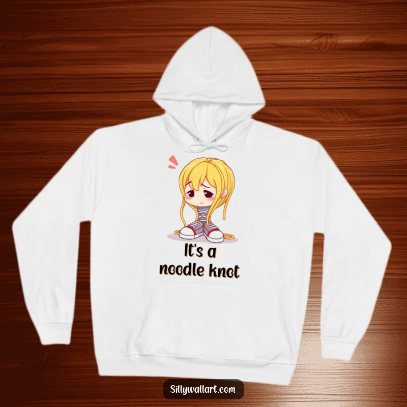 Funny hoodie depicting a confused spaghetti noodle comically struggling to tie its shoelaces, soft and humorous.