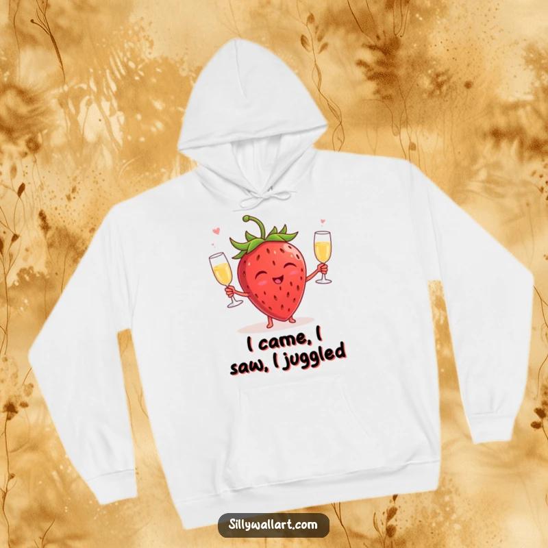 Funny hoodie showcasing a hysterically laughing strawberry expertly juggling tiny champagne glasses, perfect for cozy, celebratory, and humorous moments.