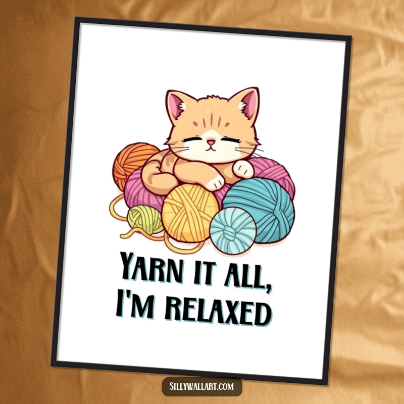 Funny Free Printable Wall Art: A very relaxed and cute cat is lounging deeply on a large pile of colorful yarn balls.