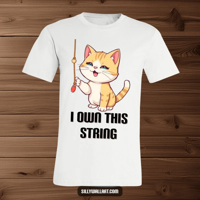 Funny t-shirt depicting a playful cat gleefully batting at a dangling string, eyes sparkling with pure, unadulterated mischief.