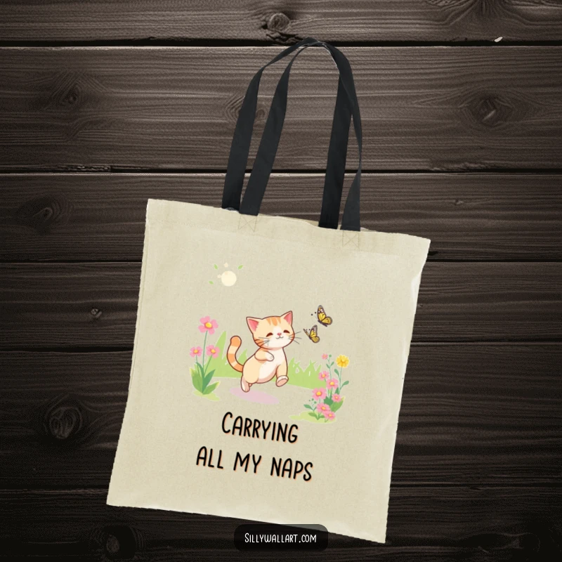 Funny tote bag illustrating a cat engrossed in chasing a butterfly within a beautiful, sunny garden.
